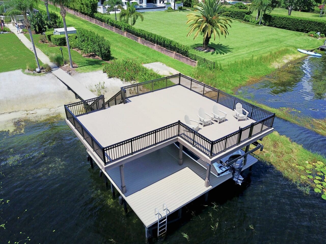 Aerial view of boat dock with upper level deck